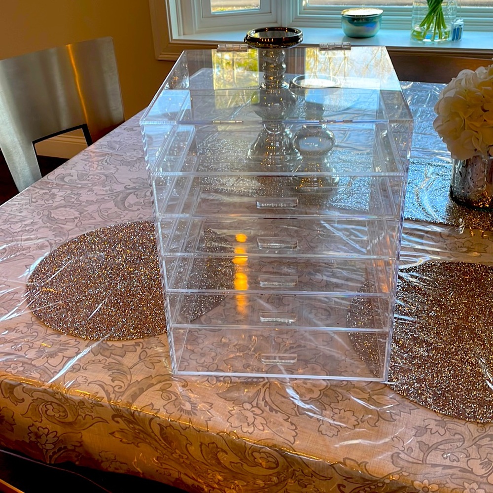 A acrylic makeup case or anything you want too do with it. Never used it.